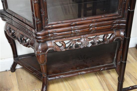 A Chinese glazed hongmu display cabinet, early 20th century, W.98cm D.40cm H.191cm